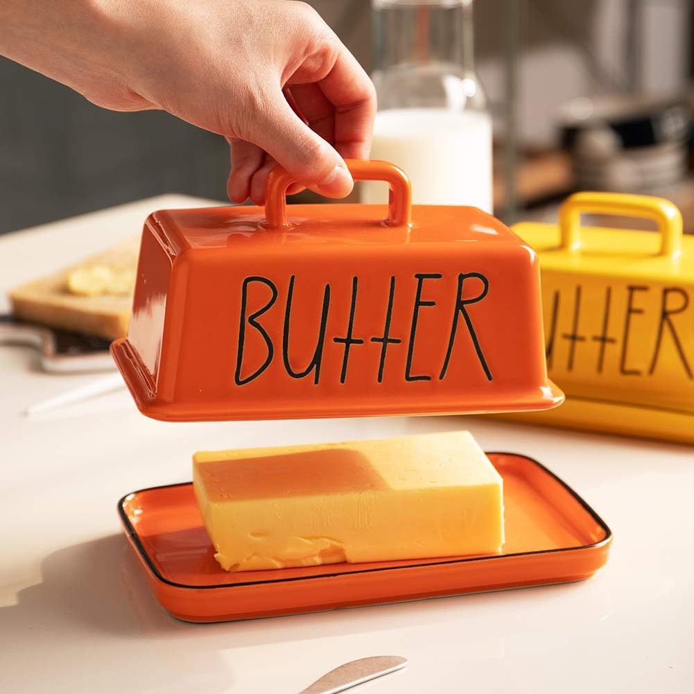 Sweejar Ceramic Butter Dish with Handle Lid, 7.3 Inch Porcelain Large Butter Keeper with Cover, Perfect for East/West Butter (Orange)