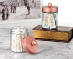 Amolliar Apothecary Jars Bathroom Storage Organizer -Countertop Storage Organizer Canister - Attractive Qtip Dispenser Holder Glass with Lid- for Cotton Swabs,Bath Salts,Hair Band / 2-Pack(Rose Gold)