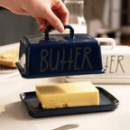Sweejar Ceramic Butter Dish with Handle Lid, 7.3 Inch Porcelain Large Butter Keeper with Cover, Perfect for East/West Butter (Navy)