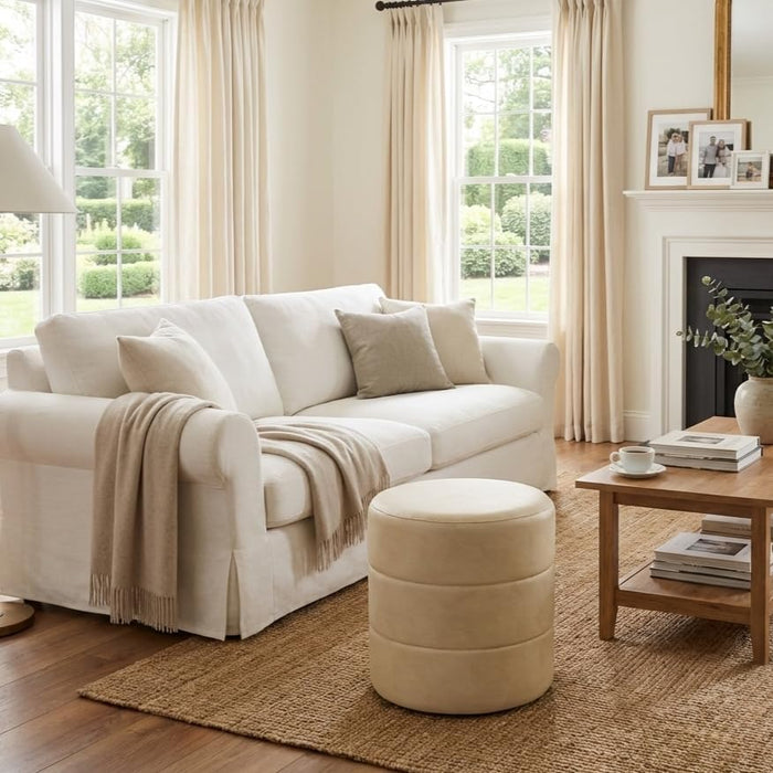 Spatial Order 18" Round Ottoman - Cream Faux Leather