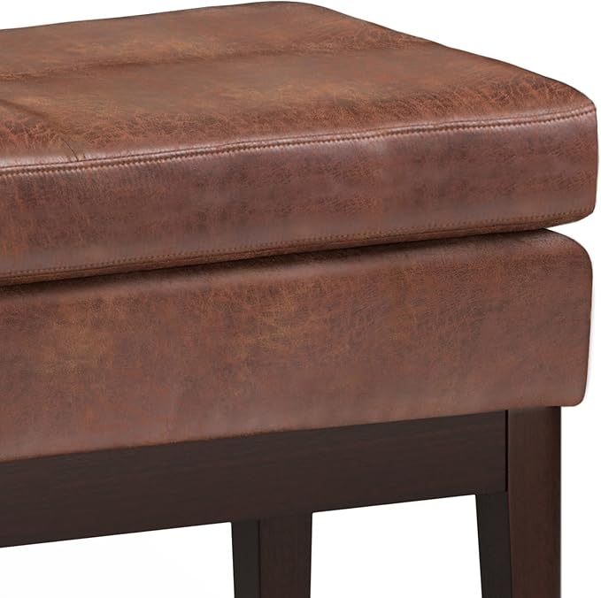 SIMPLIHOME Carlson Ottoman Bench Solid Pine Wood Frame with Faux Leather Upholstery for Living Room, Bedroom, Entryway, 26.4 x 15 x 17.5 inches, Distressed Saddle Brown