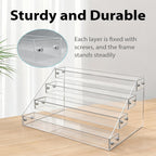 4-tier clear acrylic cascading CD holder, DVD/CD display stand, storage box, and vinyl record shelf. Holds up to 32 standard CD cases and includes 20 CD/DVD sleeves for organized media storage.