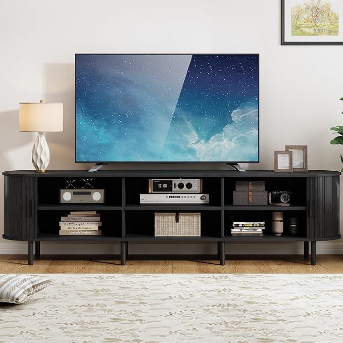 86.6" TV Stand with Power Outlet, Mid-Century Modern Television Stand, Fluted Media Console with Sliding Doors, Entertainment Center for TVs up to 90 Inch, Adjustable Shelves, Black
