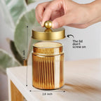 Amolliar Bronze Glass Apothecary Jar With Metal Lid & Stickers, Bathroom Qtip Dispenser Storage Canister, Perfect for Cotton Balls, Cotton Swabs, Makeup Pads, Bath Salt, Floss, 1 Pack(Gold)