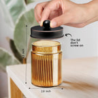 Amolliar Bronze Glass Apothecary Jar With Metal Lid & Stickers, Bathroom Qtip Dispenser Storage Canister, Perfect for Cotton Balls, Cotton Swabs, Makeup Pads, Bath Salt, Floss 1 Pack(ORB)