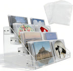 4-tier clear acrylic cascading CD holder, DVD/CD display stand, storage box, and vinyl record shelf. Holds up to 32 standard CD cases and includes 20 CD/DVD sleeves for organized media storage.