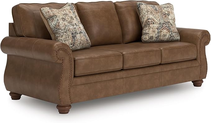 Signature Design by Ashley Shadsburne Rustic Faux Leather Sofa with Nailhead Trim and 2 Throw Pillows, Brown