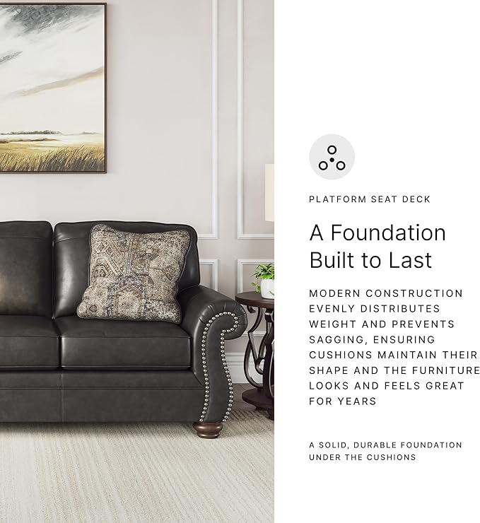 Signature Design by Ashley Shadsburne Rustic Faux Leather Sofa with Nailhead Trim and 2 Chenille Throw Pillows, Pillows With Soft Polyfill, Reinforced Frame For Added Stability, Black