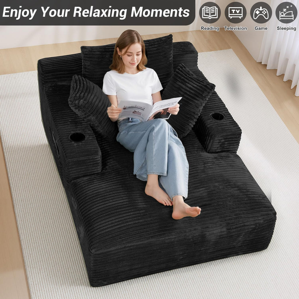 50" x 68" Corduroy Chaise Lounge, Cup Holders, Black | Oversized corduroy chaise with a deep sleeper seat, built-in cup holders, and 3 pillows for reading, lounging.
