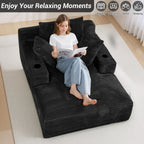 50" x 68" Corduroy Chaise Lounge, Cup Holders, Black | Oversized corduroy chaise with a deep sleeper seat, built-in cup holders, and 3 pillows for reading, lounging.