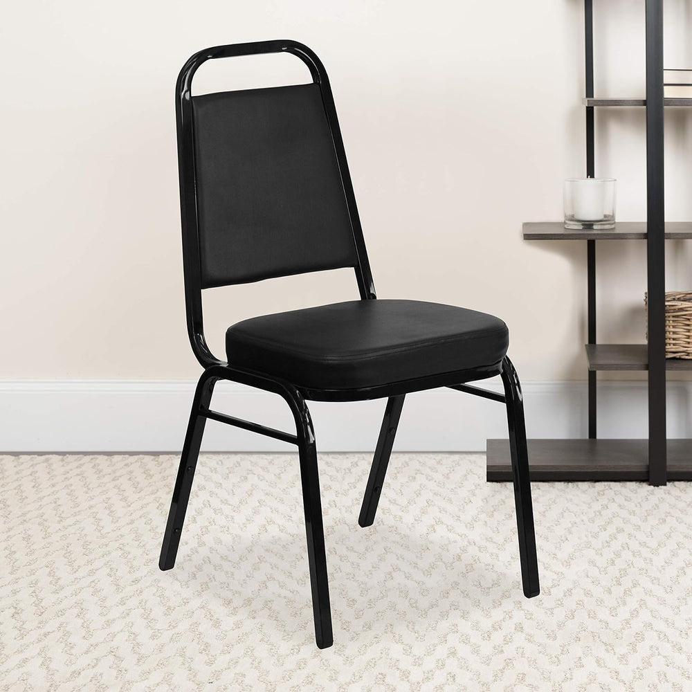 EMMA + OLIVER Black Vinyl Trapezoidal Back Stacking Banquet Chair