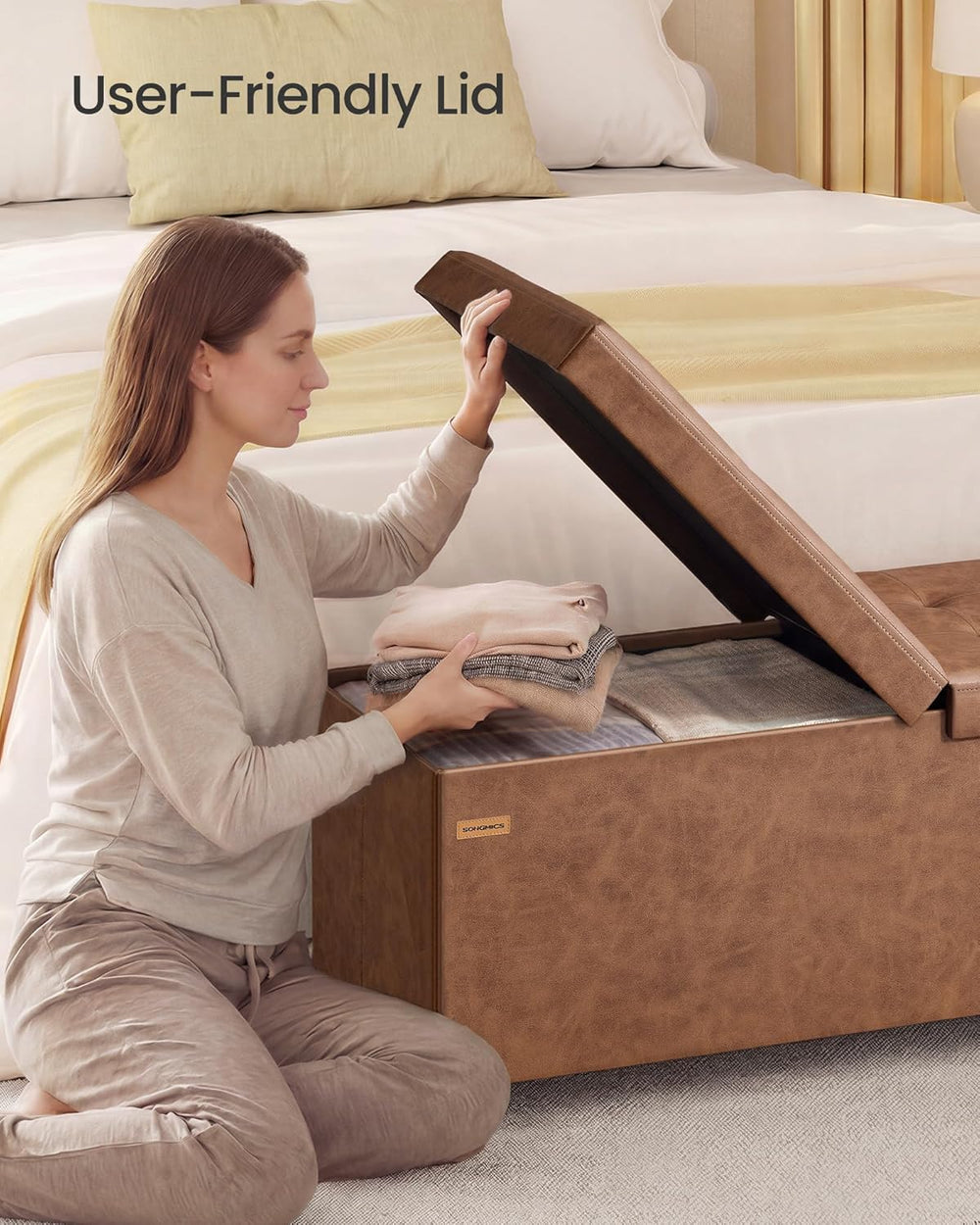 SONGMICS Storage Ottoman Bench with Legs, Flipping Lid, 43.3 Inches | Folding...