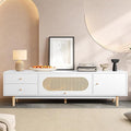 Marzzi Modern 70" TV Stand with Rattan Door, Mid-Century Boho Entertainment Center with Storage Cabinet & 2 Drawers, White Media Console with Cable Hole, Solid Wood Legs
