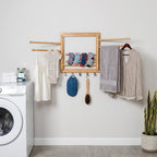 Honey-Can-Do Bamboo Wall-Mount Swivel-Arm Drying Rack, 80 lb, Natural | Wall-mount bamboo rack with 8 swivel arms holds 80 lb; folds to 1.7 in deep. Ships assembled with 5 steel hooks.