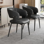 Modern Dining Chairs Set of 4, Faux Leather Upholstered Kitchen Chairs with Curved Back and Metal Legs, Mid Century Chairs for Dining Room, Kitchen, or Café (Black)