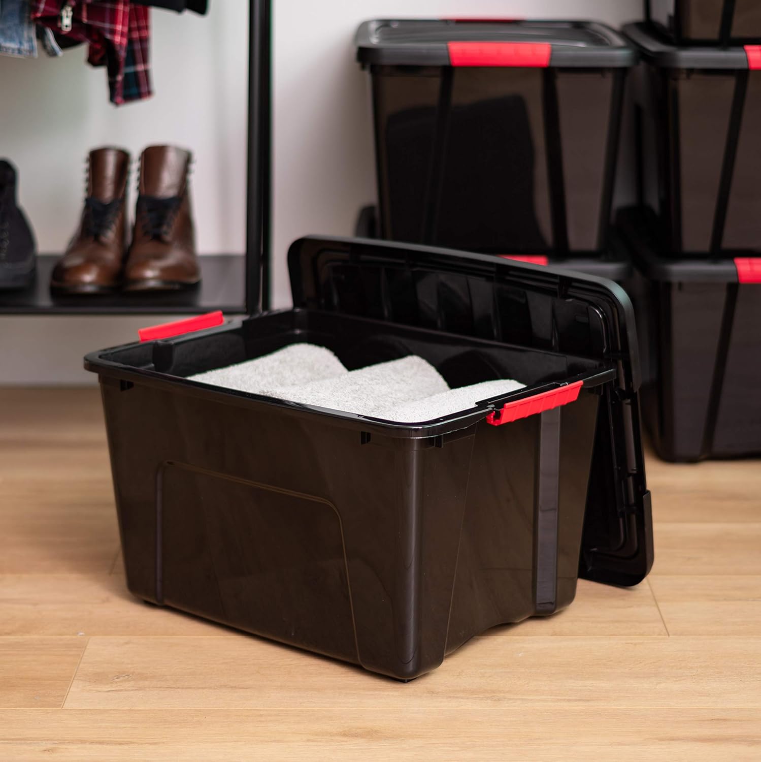 IRIS USA 40 Qt Stackable Plastic Storage Bins with Lids, 4 Pack - BPA-Free, Made in USA - Garage Organizing Solution, Latches, Durable Nestable Containers, Secure Pull Handle - Black