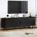70.8" TV Stand with Power Outlet, Mid-Century Modern Television Stand, Fluted Media Console with Sliding Doors, Entertainment Center for TVs up to 60 Inch, Adjustable Shelves, Black