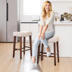 PrimeZone 26 Inch Solid Wood Saddle Backless Bar Stools Set of 2, Beige | Counter Height Barstools with Footrest & Nailhead Trim, Modern Farmhouse Upholstered Linen Counter Stools for Kitchen Island