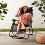 Amazon Basics Zero Gravity Lounge Chair with Pillow, Foldable Outdoor Reclining Chair for Patio and Beach, Weather-Resistant Textilene, 300 lb Capacity, 26", Black